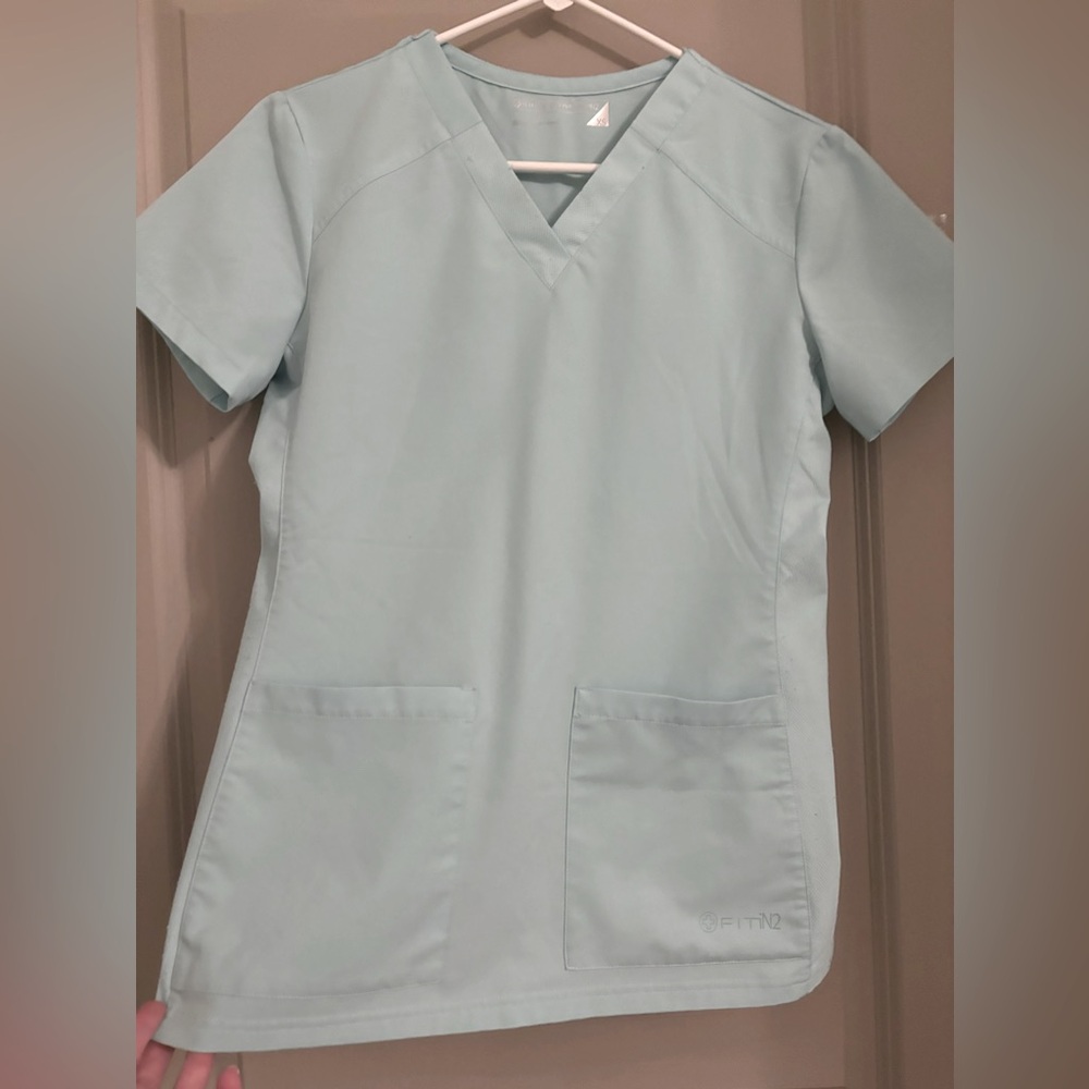 Women’s light blue White Cross scrub top